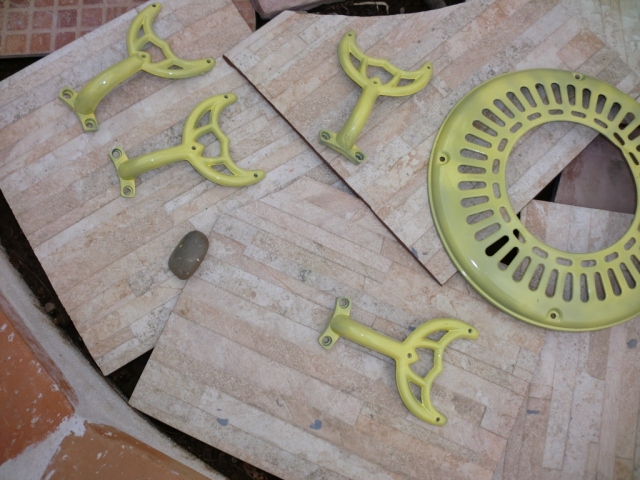 Here's the faceplate and the hardware from the blades after their first coat of yellow paint.